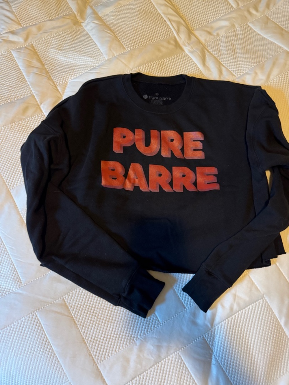 Pure Barre Black Cropped Crewneck with Bold Orange-Red Logo